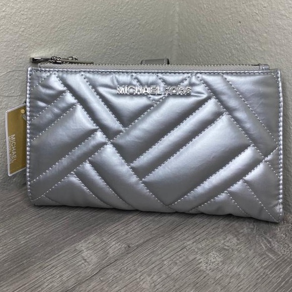 Michael Kors Handbags - Michael Kors Peyton LG Double Zip Wristlet silver